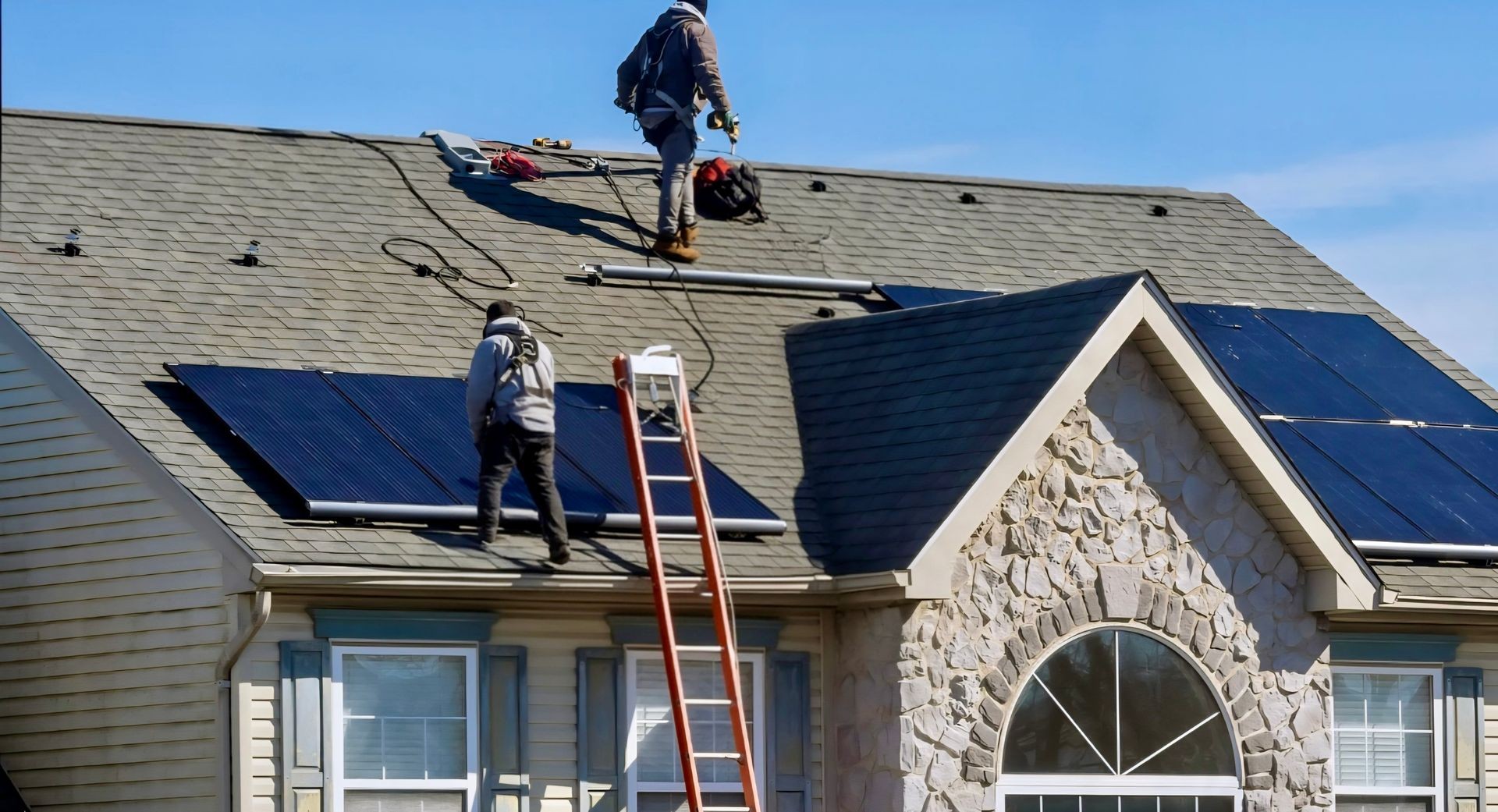 Sunrich Power installing solar panels on roof of Massachusetts home